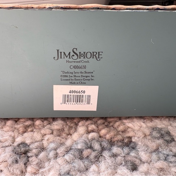 Jim shore “dashing into the season”